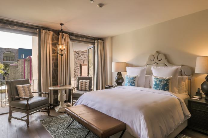 Imagen de la habitación del Hotel Banyan Tree Puebla. Foto 14