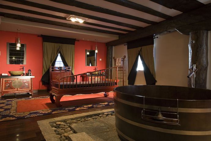 Imagen de la habitación del Hotel Banyan Tree Ringha. Foto 9