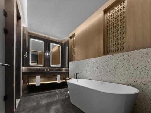 Imagen de la habitación del Hotel Banyan Tree Suzhou Shishan. Foto 9