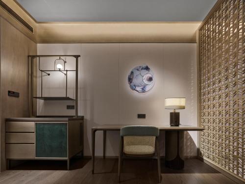 Imagen de la habitación del Hotel Banyan Tree Suzhou Shishan. Foto 11