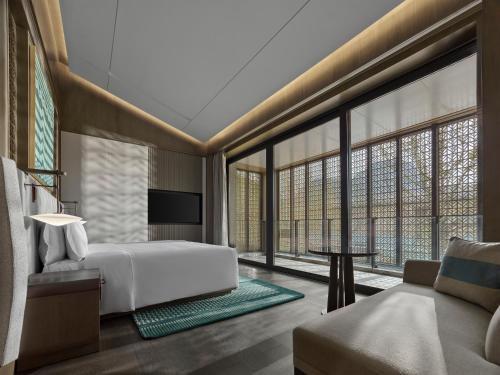 Imagen de la habitación del Hotel Banyan Tree Suzhou Shishan. Foto 15