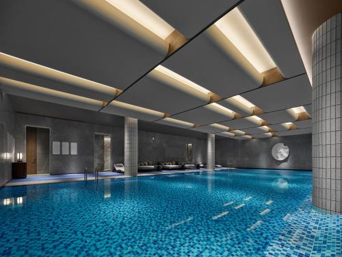 Imagen de la piscina del Hotel Banyan Tree Suzhou Shishan. Foto 20