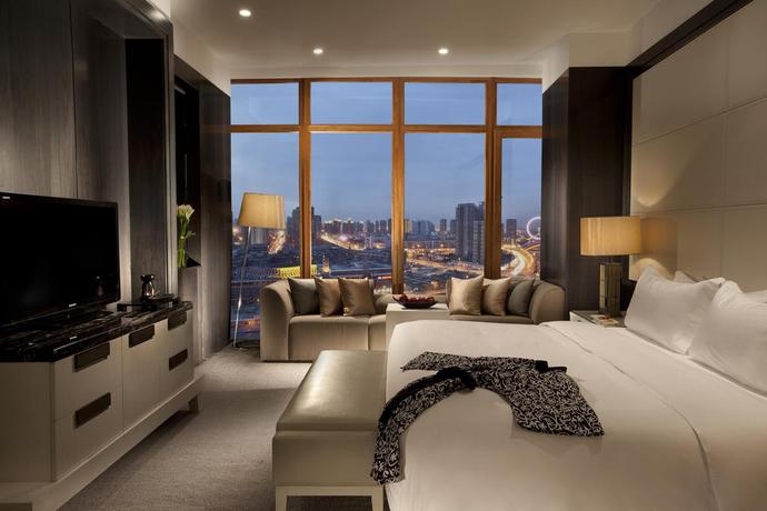 Imagen de la habitación del Hotel Banyan Tree Tianjin Riverside. Foto 5
