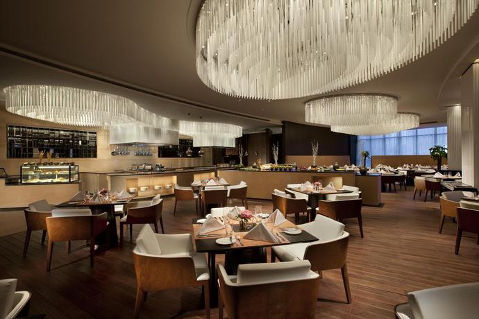 Imagen del bar/restaurante del Hotel Banyan Tree Tianjin Riverside. Foto 2
