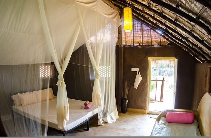 Imagen de la habitación del Hotel Banyan Tree Yoga. Foto 5