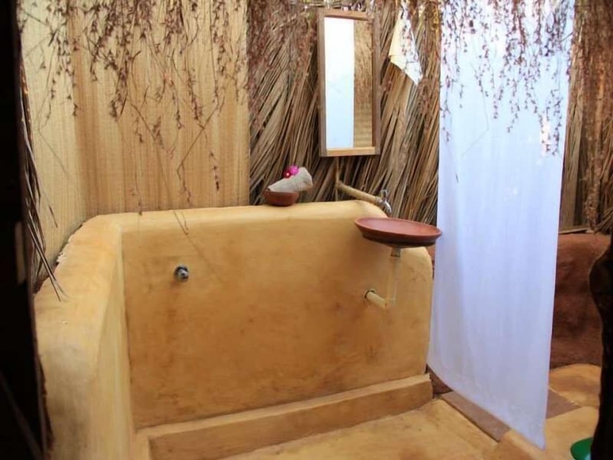 Imagen de la habitación del Hotel Banyan Tree Yoga. Foto 9