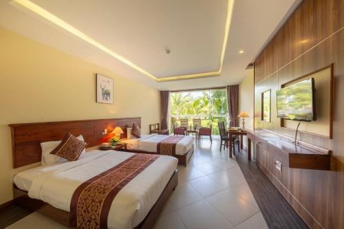 Imagen de la habitación del Hotel Bao Ninh Resort. Foto 6