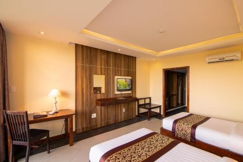 Imagen de la habitación del Hotel Bao Ninh Resort. Foto 7