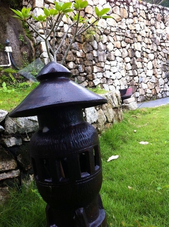 Imagen de los exteriores del Hotel Bao Sheng Durian Farm. Foto 12