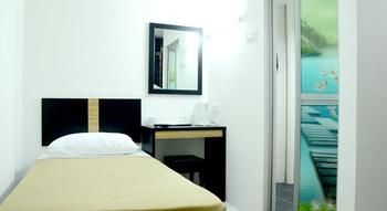 Imagen de la habitación del Hotel Bao Shu. Foto 15