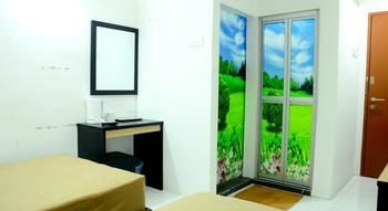Imagen de la habitación del Hotel Bao Shu. Foto 16