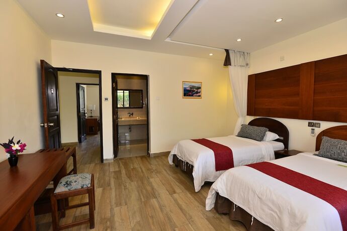 Imagen de la habitación del Hotel Baobab Holiday Resort, ziwa La Ng'ombe ward. Foto 15