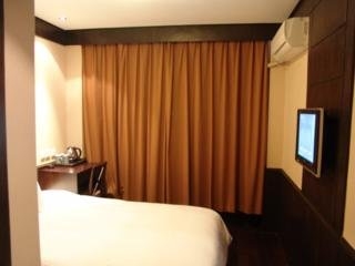 Imagen de la habitación del Hotel Baolong Home. Foto 5