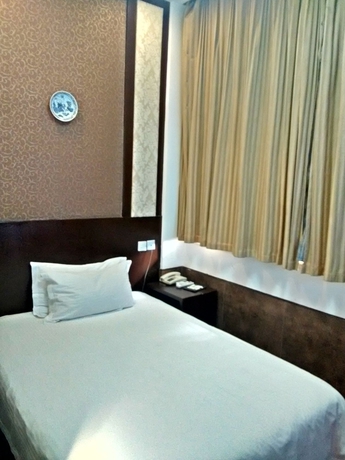 Imagen de la habitación del Hotel Baolong Homelike Baogang Youyi Branch Shangh. Foto 2