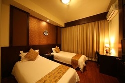Imagen de la habitación del Hotel Baolong Homelike Hotel (zhongshan Branch). Foto 3