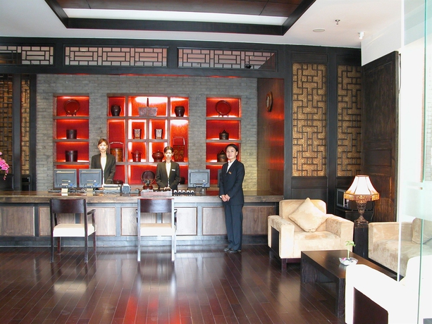Imagen de los interiores del Hotel Baolong Homelike Wu Song Shanghai. Foto 4