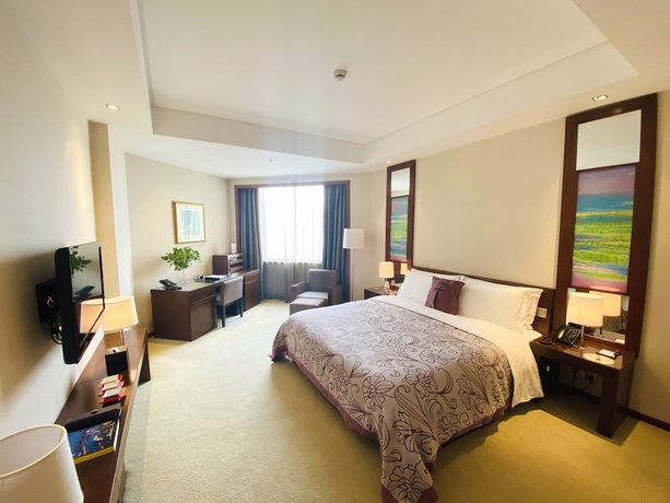 Imagen de la habitación del Hotel Baolong Hotel Shanghai. Foto 3