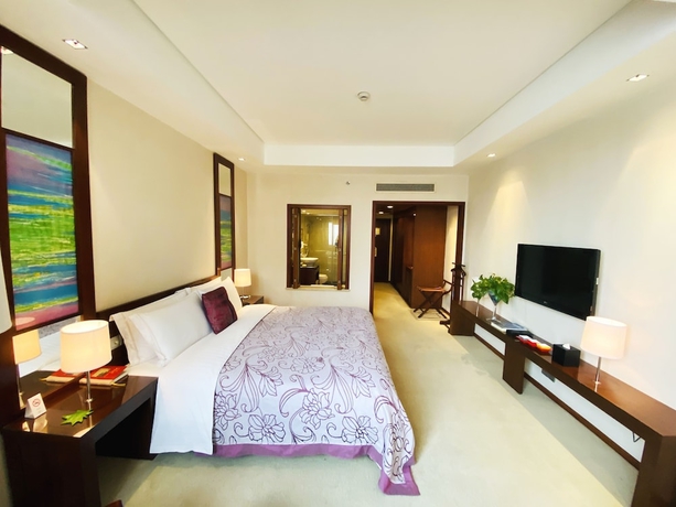 Imagen de la habitación del Hotel Baolong Hotel Shanghai. Foto 4