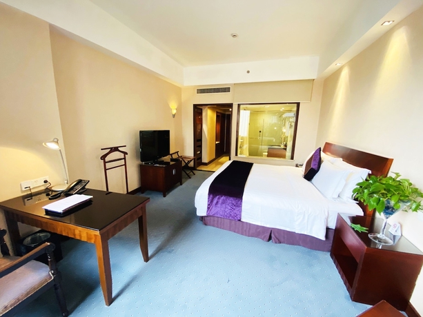 Imagen de la habitación del Hotel Baolong Hotel Shanghai. Foto 5