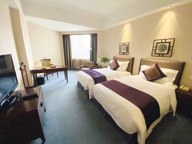 Imagen de la habitación del Hotel Baolong Hotel Shanghai. Foto 9