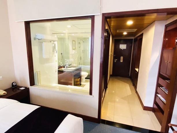 Imagen de la habitación del Hotel Baolong Hotel Shanghai. Foto 10