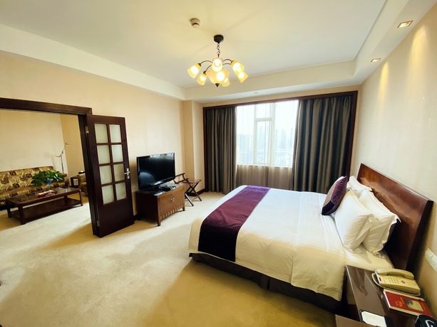 Imagen de la habitación del Hotel Baolong Hotel Shanghai. Foto 11