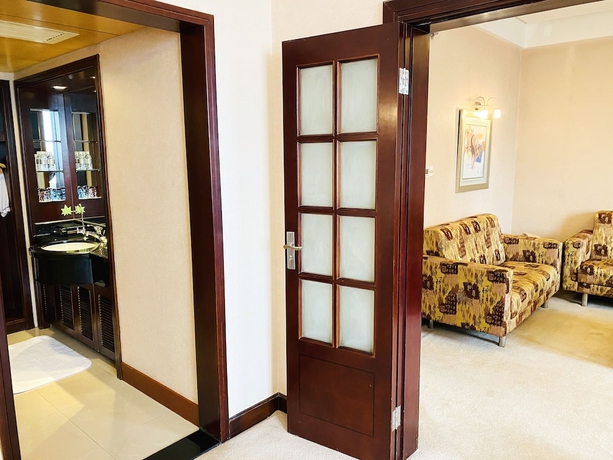 Imagen de la habitación del Hotel Baolong Hotel Shanghai. Foto 13