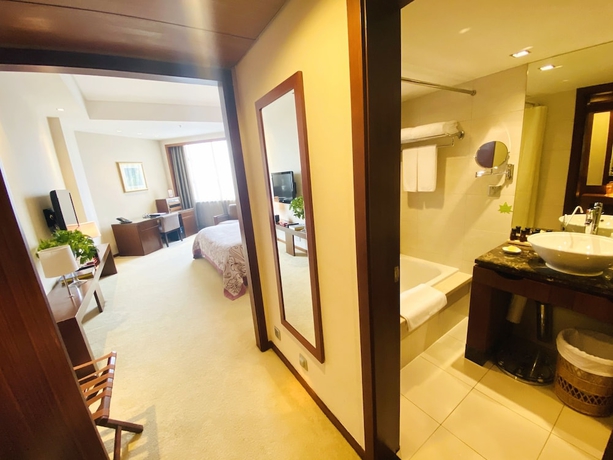 Imagen de la habitación del Hotel Baolong Hotel Shanghai. Foto 15