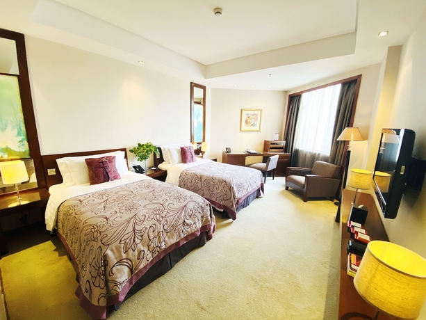 Imagen de la habitación del Hotel Baolong Hotel Shanghai. Foto 16
