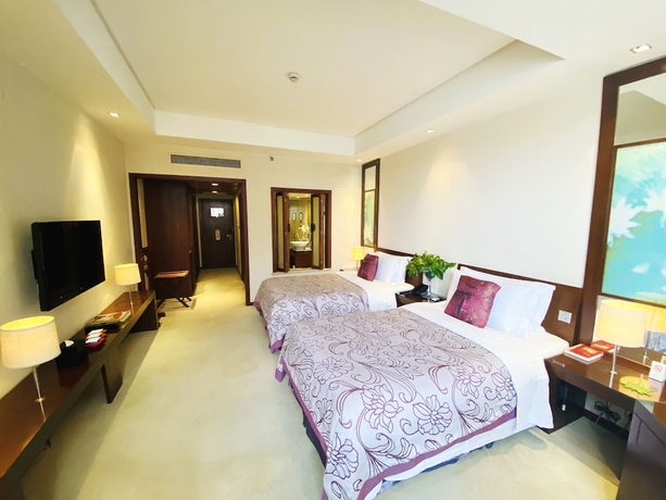 Imagen de la habitación del Hotel Baolong Hotel Shanghai. Foto 17