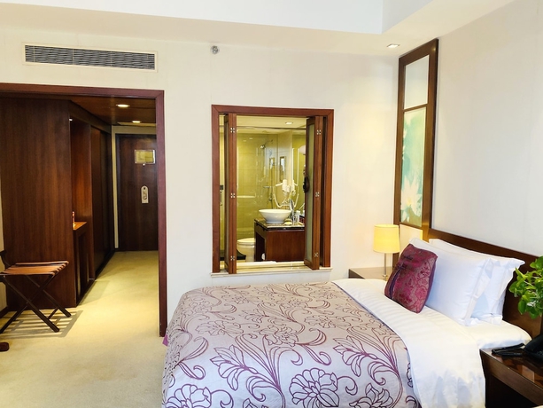 Imagen de la habitación del Hotel Baolong Hotel Shanghai. Foto 18