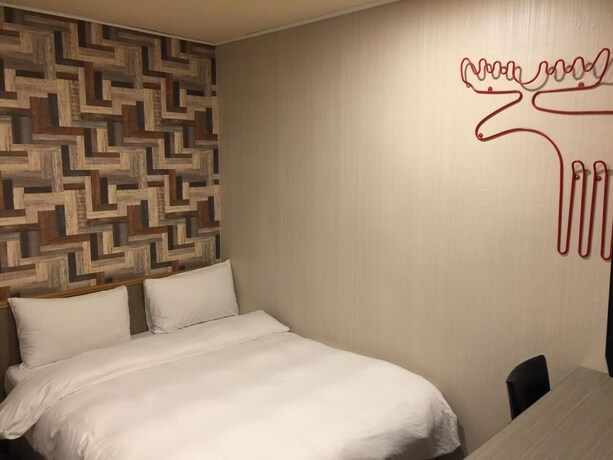 Imagen de la habitación del Hotel Baoshan. Foto 4