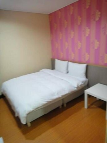 Imagen de la habitación del Hotel Baoshan. Foto 5