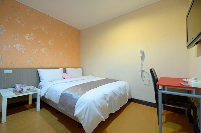 Imagen de la habitación del Hotel Baoshan. Foto 11