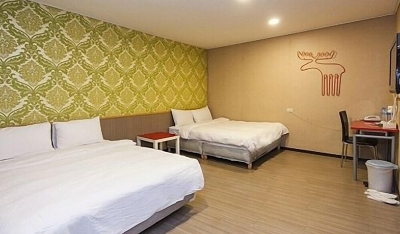 Imagen de la habitación del Hotel Baoshan. Foto 13