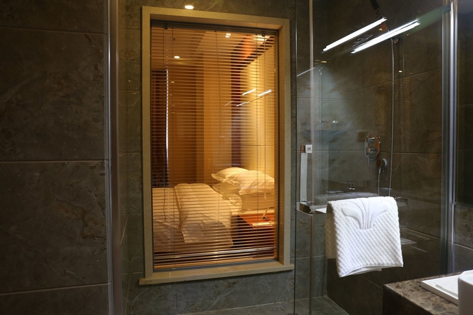 Imagen de la habitación del Hotel Baotou Wassim Tianfu Plaza. Foto 12