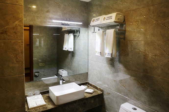 Imagen de la habitación del Hotel Baotou Wassim Tianfu Plaza. Foto 13