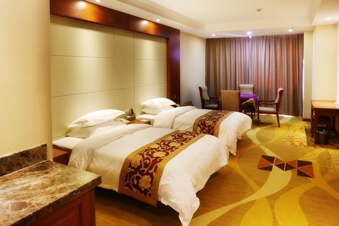 Imagen de la habitación del Hotel Baotou Wassim Tianfu Plaza. Foto 17