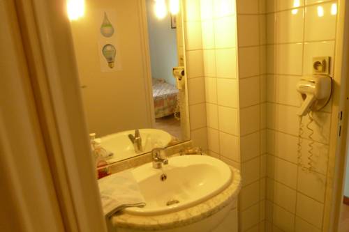 Imagen de la habitación del Hotel Bar Restaurant Du Centre. Foto 7