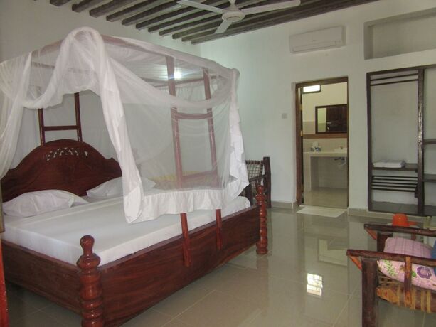 Imagen de la habitación del Hotel Baraka Beach Bungalows. Foto 12