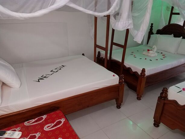 Imagen de la habitación del Hotel Baraka Beach Bungalows. Foto 13