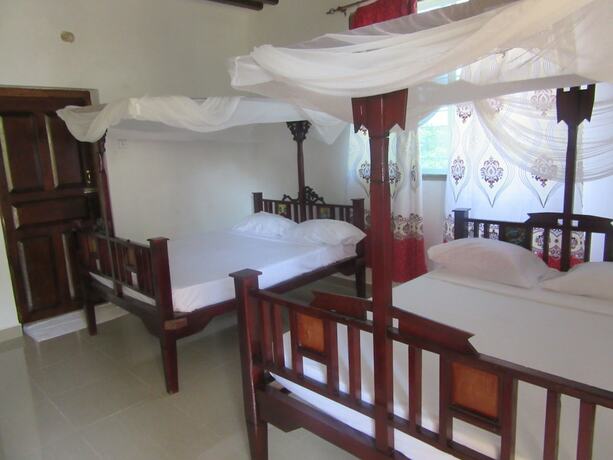Imagen de la habitación del Hotel Baraka Beach Bungalows. Foto 14