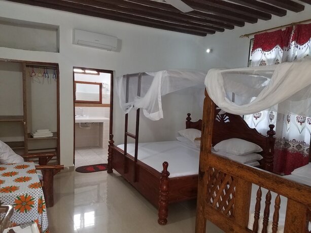 Imagen de la habitación del Hotel Baraka Beach Bungalows. Foto 16
