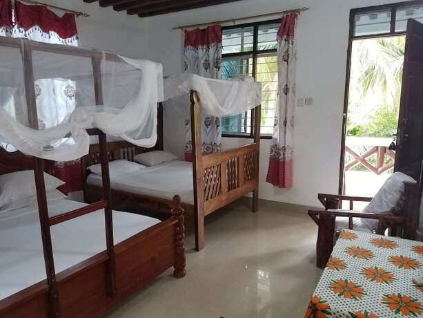Imagen de la habitación del Hotel Baraka Beach Bungalows. Foto 17