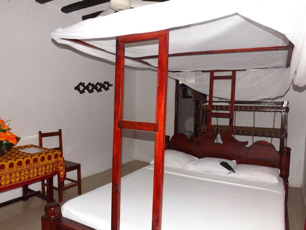 Imagen de la habitación del Hotel Baraka Beach Bungalows. Foto 18