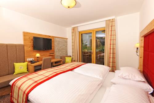 Imagen de la habitación del Hotel Barbarahof Saalbach. Foto 14