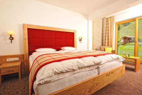 Imagen de la habitación del Hotel Barbarahof Saalbach. Foto 15