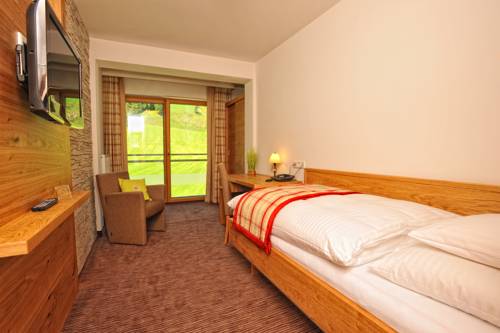 Imagen de la habitación del Hotel Barbarahof Saalbach. Foto 16