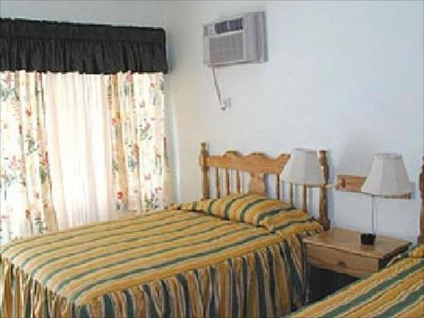 Imagen de la habitación del Hotel Bar-b-barn Beach. Foto 5
