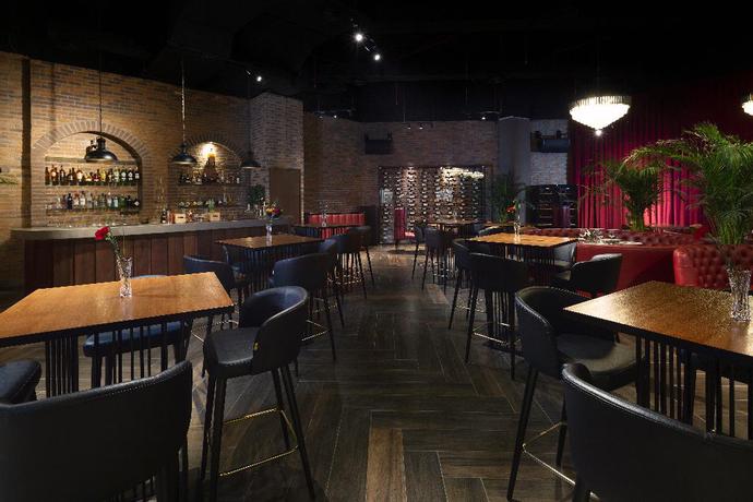 Imagen del bar/restaurante del Hotel Barceló Al Jaddaf. Foto 10